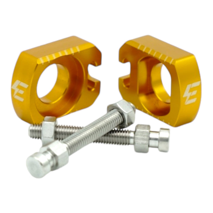 Gold anodized chain tensioner blocks with mounting bolts for Surron swingarm