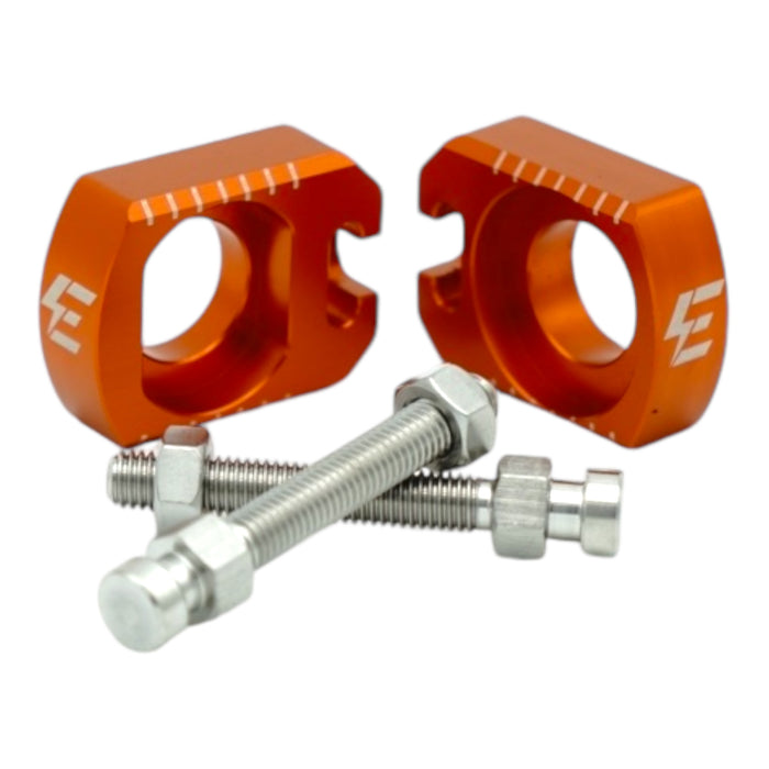 Orange anodized chain tensioner blocks with mounting bolts for Surron swingarm