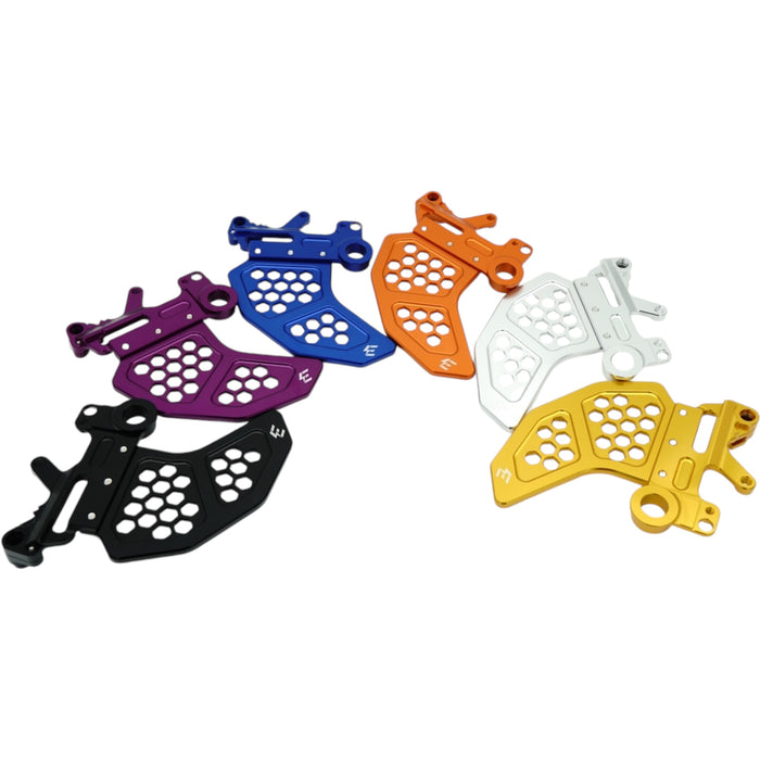 Assorted anodized CNC chainring guards for e-bikes in multiple colors