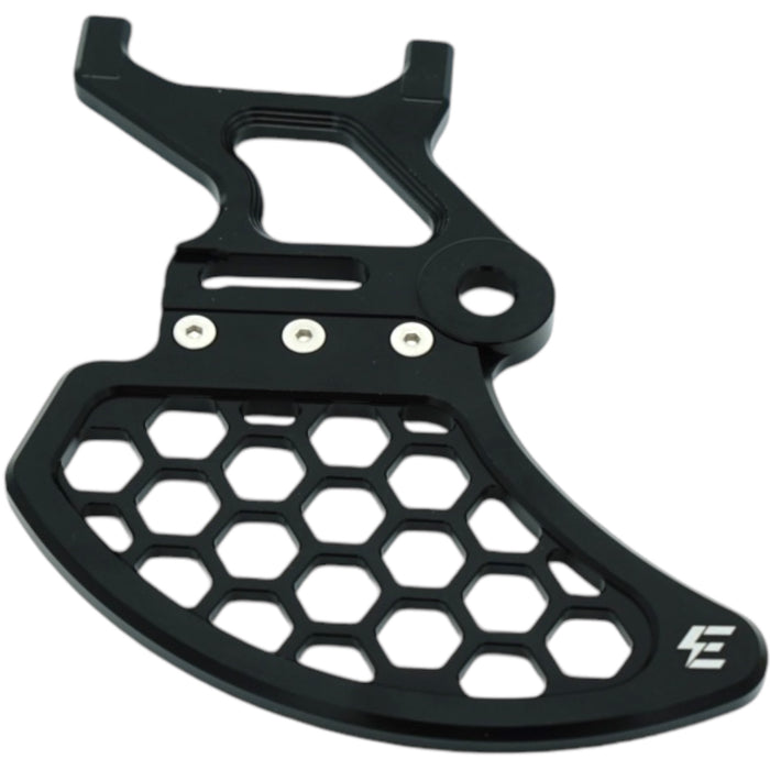 Black anodized Surron brake disc guard with honeycomb cutouts, aluminum