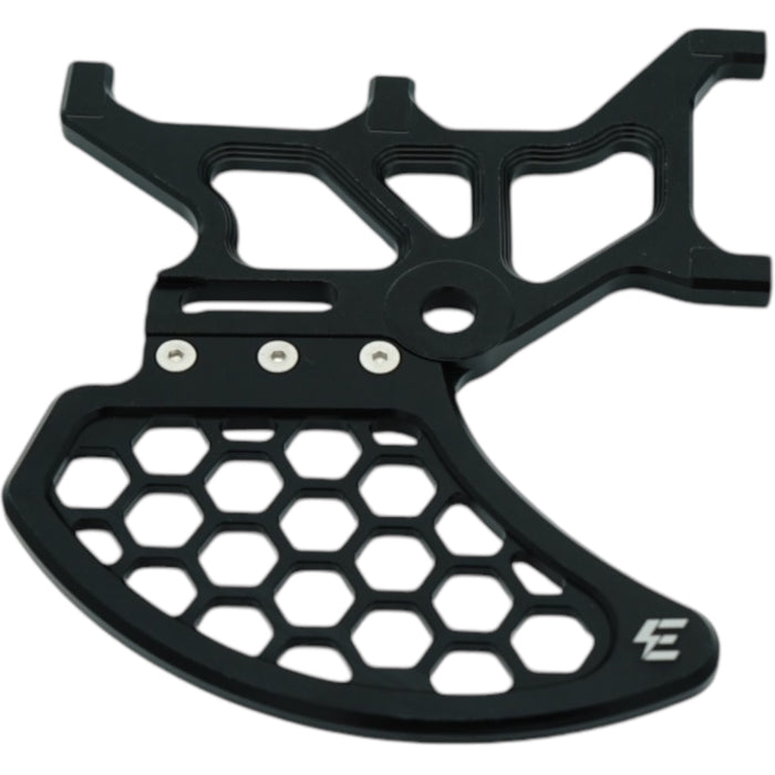Black CNC aluminum chainring guard with honeycomb cutouts for e-bike drivetrain