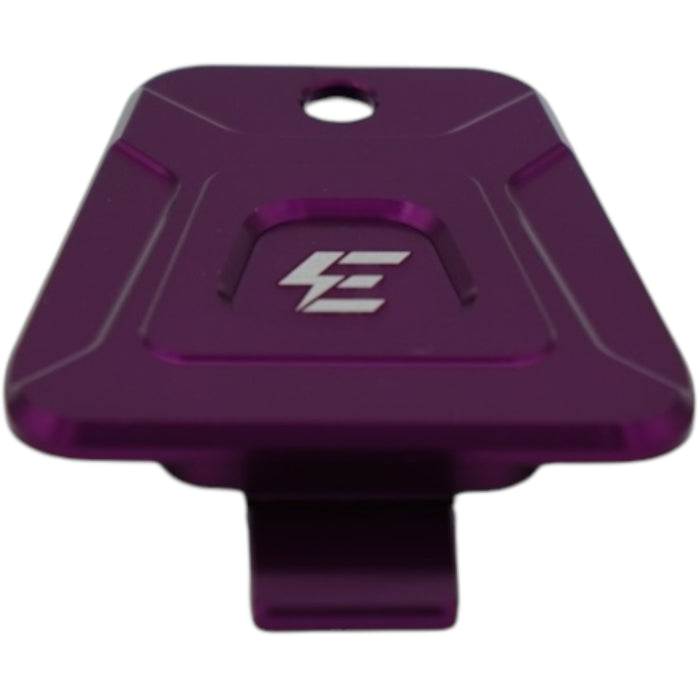 Purple anodized Surron battery cover plate with embossed logo, lightweight aluminum