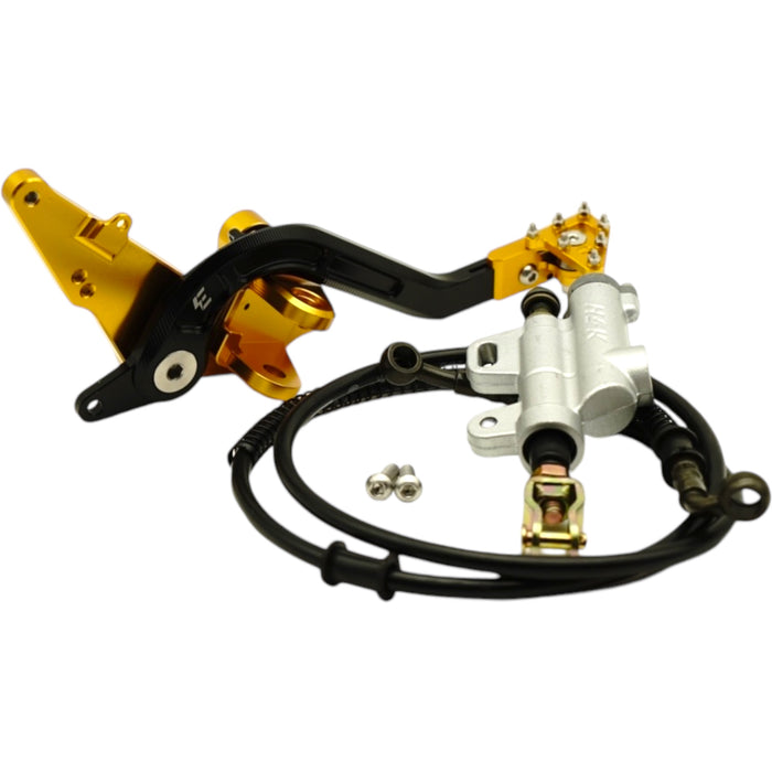 Gold and black rear brake pedal kit with master cylinder and hose
