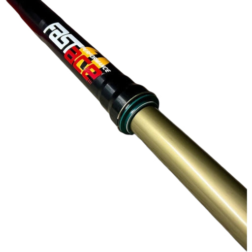 Close-up of a black and gold mountain bike suspension fork with Fastace logo.