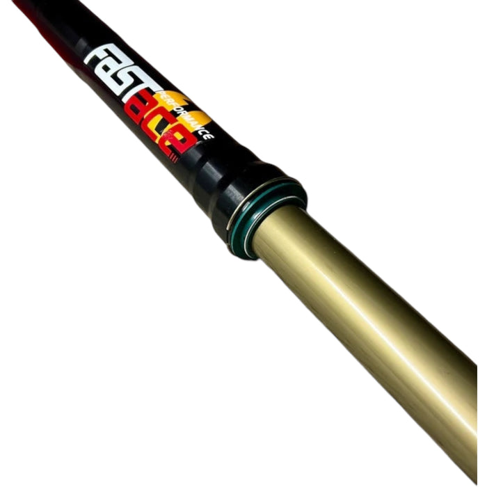 Close-up of a black and gold mountain bike suspension fork with Fastace logo.