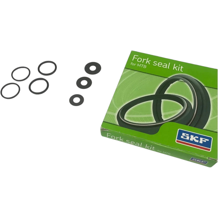 Green SKF fork seal kit box with black rubber seals and washers for MTB.