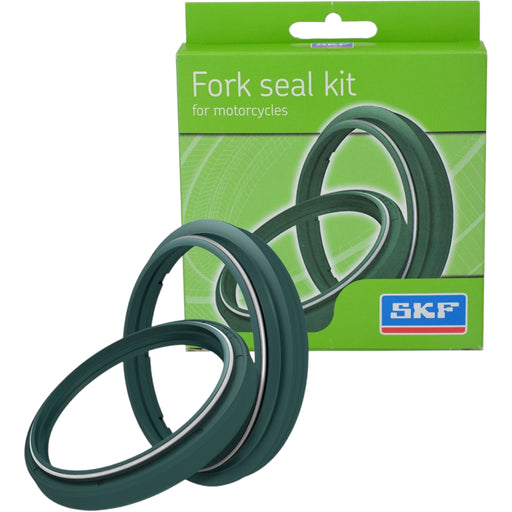 SKF green fork seal kit for motorcycles with packaging box in background.