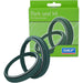 SKF green fork seal kit for motorcycles with packaging box in background.