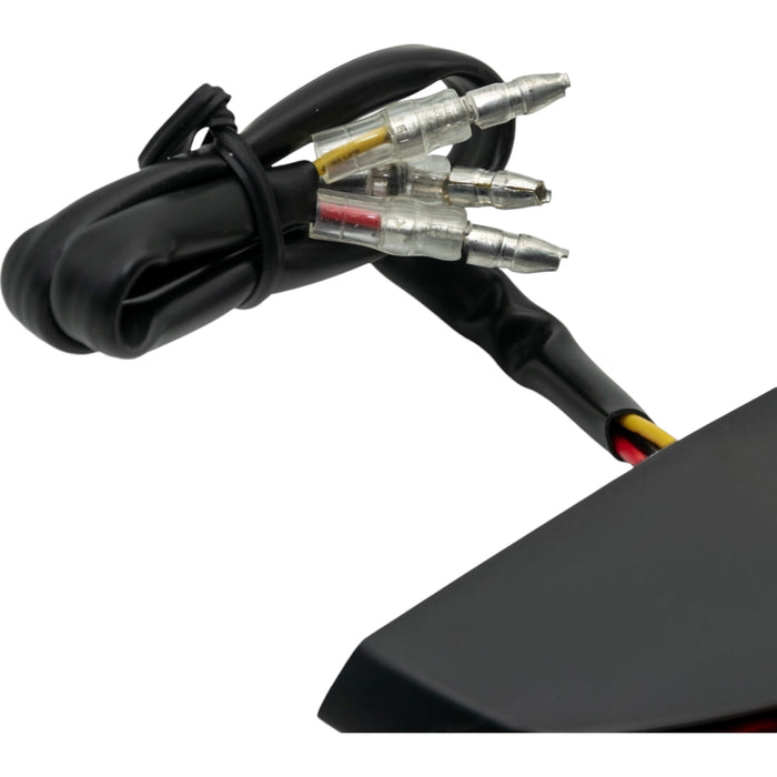 Black motorcycle LED tail light wiring with three bullet connectors and heat shrink
