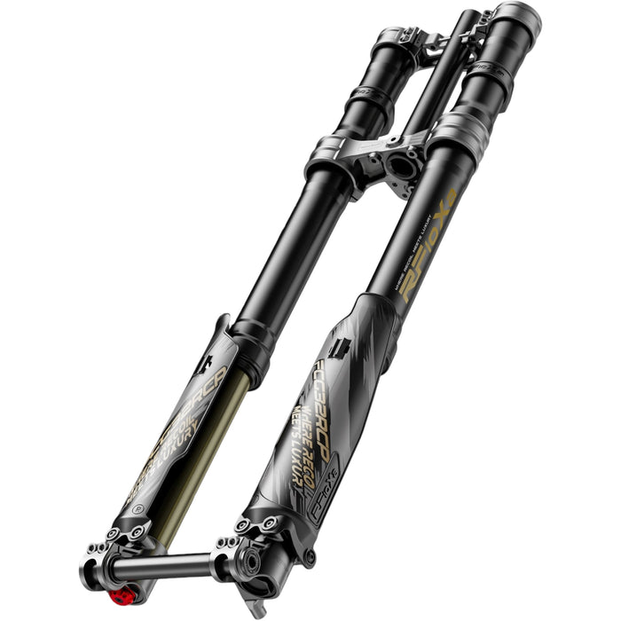 Black and gold mountain bike suspension fork with decals and axle on white.