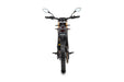 Komodo L3 electric dirt bike rear view, narrow profile with knobby tire and mirrors