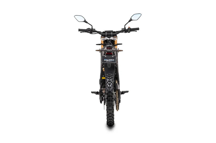 Komodo L3 electric dirt bike rear view, narrow profile with knobby tire and mirrors