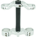 Silver motorcycle triple tree clamp with black steering stem on white background.