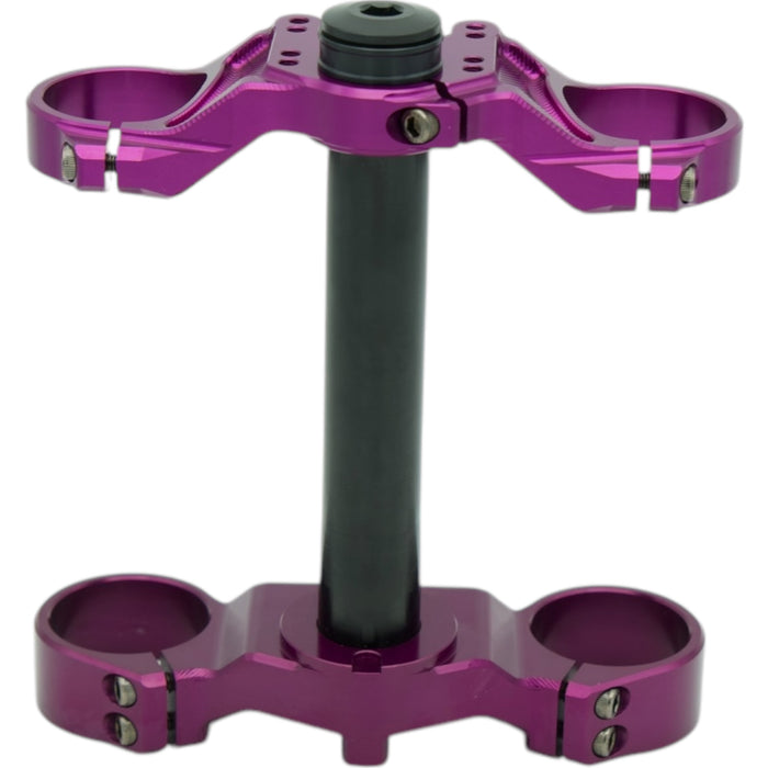 Purple anodized motorcycle triple tree clamp with black steering stem on white.