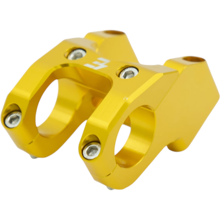 Gold anodized motorcycle handlebar riser clamp with bolts, CNC machined